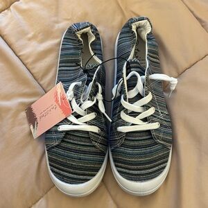 Twisted slip in and step out sneakers